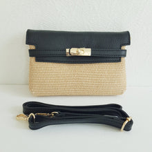 Lataa kuva Galleria-katseluun, Tyylikäs kesälaukku, joka sopii päivä tai ilta laukuksi. Laukun metalliosat kullanväriset. Laukussa yksi tasku ja vetoketjullinen piilotasku. Värit: valkoinen, beige, musta Laukussa yksitasku ja vetoketjullinen piilotasku. Materiaali: nahka ja raffia Hihnan max pituus 125 cm Koko: 22 cm x 15cm x 4cm Valmistusmaa Italia