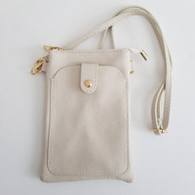 Lataa kuva Galleria-katseluun, Tyylikäs ja käytännöllinen MARTINA puhelinlaukku sopii hyvin sekä arkeen että juhlaan. Laukussa on yksi vetoketjullinen tasku ja edessä myös tilava tasku nepparikiinnityksellä ja kultaisilla metalliosilla.