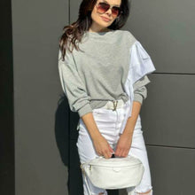 Lataa kuva Galleria-katseluun, Trendikäs ROSI crossbody vyölaukku on käytännöllinen ja tyylikäs asuste. Laukussa on kaksi vetoketjullista taskua: ulkotasku ja sisätasku, myös laukun kiinnitystapa on vetoketju. Ristivartalolaukkuun kuuluu lyhyehkö kantokahva ja säädettävä hihna. Materiaali: aito nahka Säädettävä olkahihna: max pituus 100 cm, leveys 2.5 cm Mitat: pituus 35 cm, korkeus 17 cm Valmistettu Italiassa