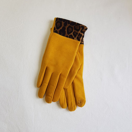 Tyylikkäät, ihanan pehmeät ja joustavat sormikkaat, etusormessa on kosketusnäyttöomimaisuus. Väri keltainen. Koko M.